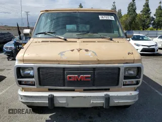 1992 GMC Vandura z VIN 2GTGG39K7N4508329, wystawiony jako Copart lot #56752215 z przebiegiem 248 713 mil mil oraz Tytuł czysty. Historia ofert i sprzedaży dostępna na DreamBid. Obrazek 5.