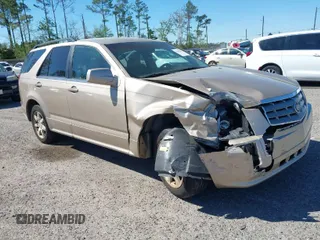 2006 Cadillac SRX z VIN 1GYEE637760197643, wystawiony jako IAAI lot #41864261 z przebiegiem 223 047 mil mil oraz . Historia ofert i sprzedaży dostępna na DreamBid. Obrazek 1.
