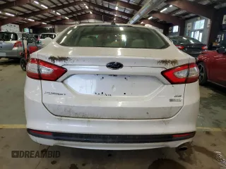 2014 Ford Fusion SE z VIN 3FA6P0HD5ER310493, wystawiony jako Copart lot #58197095 z przebiegiem 135 952 mil mil oraz Tytuł czysty. Historia ofert i sprzedaży dostępna na DreamBid. Obrazek 6.