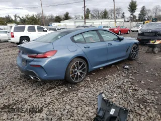 2020 BMW 8 Series 840i with VIN WBAGV4C00LCD53148, listed as a Copart auction lot 38031863 with 61,742 mi miles. Bid and sale history available at carsss.com. Image 3.