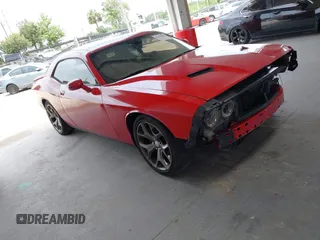2015 Dodge Challenger SXT Plus with VIN 2C3CDZBG2FH823022, listed as a IAAI auction lot 42425858 with 131,960 mi miles and . Bid and sale history available at DreamBid. Image 1.