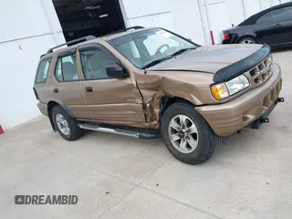 2000 Isuzu Rodeo S with VIN 4S2CK58W3Y4316966, listed as a IAAI auction lot 42003598 with 106,187 mi miles and . Bid and sale history available at carsss.com. Image 13.