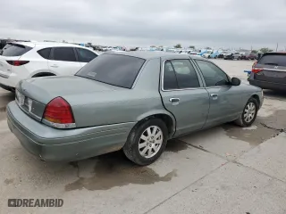 2006 Ford Crown Victoria LX with VIN 2FAFP74W66X132385, listed as a Copart auction lot 50997775 with 214,277 mi miles and Salvage Title. Bid and sale history available at carsss.com. Image 3.