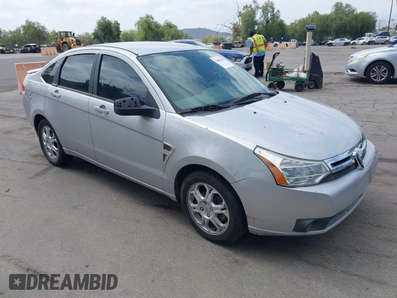 2008 Ford Focus SE with VIN 1FAHP35N18W199448, listed as a IAAI auction lot 42088860 with 174,391 mi miles. Bid and sale history available at carsss.com. Image 1.