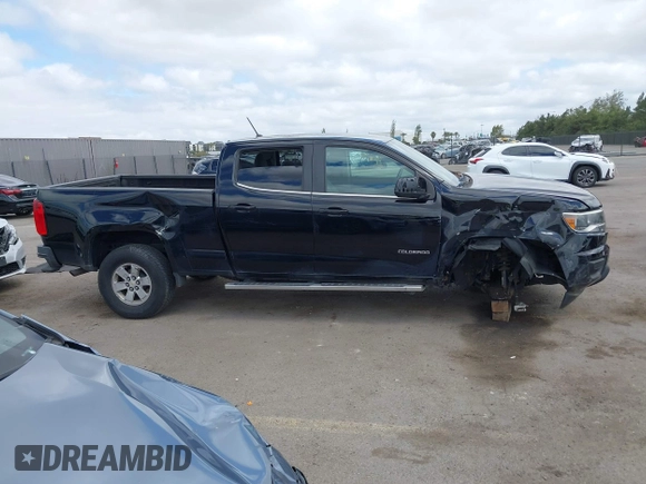 2019 Chevrolet Colorado 2WD Work Truck z VIN 1GCGSBEN6K1146263, wystawiony jako IAAI lot #42247164 z przebiegiem 50 057 mil mil oraz . Historia ofert i sprzedaży dostępna na DreamBid. Obrazek 14.