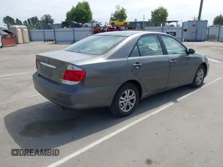 2005 Toyota Camry LE with VIN 4T1BF32K35U590150, listed as a IAAI auction lot 42053337 with 180,627 mi miles and . Bid and sale history available at DreamBid. Image 4.
