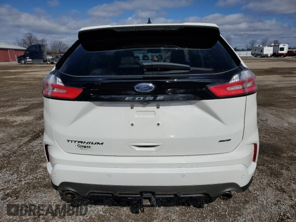 2021 Ford Edge Titanium z VIN 2FMPK4K93MBA52444, wystawiony jako Copart lot #51752835 z przebiegiem 67 137 mil mil oraz Czysty tytuł • Clean title. Historia ofert i sprzedaży dostępna na DreamBid. Obrazek 6.