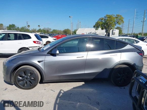 2025 Tesla Model Y Long Range with VIN 7SAYGDED7SA376233, listed as a IAAI auction lot 41777876 with 70 mi miles and . Bid and sale history available at DreamBid. Image 14.