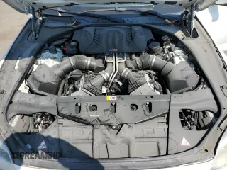 2015 BMW M6 z VIN WBS6C9C5XFD467711, wystawiony jako Copart lot #66574644 z przebiegiem 101 001 mil mil oraz Szkody całkowita. Historia ofert i sprzedaży dostępna na DreamBid. Obrazek 13.