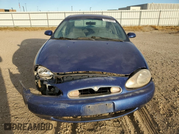 1996 Mercury Sable GS z VIN 1MELM50U3TA659219, wystawiony jako Copart lot #74373944 z przebiegiem 156 398 mil mil oraz Szkody całkowita. Historia ofert i sprzedaży dostępna na DreamBid. Obrazek 5.