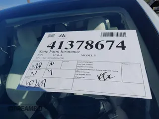 2021 Tesla Model Y Standard Range z VIN 5YJYGDED4MF162982, wystawiony jako IAAI lot #41378674 z przebiegiem 60 267 mil mil oraz . Historia ofert i sprzedaży dostępna na DreamBid. Obrazek 18.