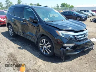 2018 Honda Pilot Touring with VIN 5FNYF6H9XJB060555, listed as a IAAI auction lot 42398883 with 46,473 mi miles and . Bid and sale history available at DreamBid. Image 1.