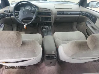 1993 Dodge Intrepid z VIN 2B3ED56F1PH641071, wystawiony jako Copart lot #62796754 z przebiegiem 131 285 mil mil oraz Czysty tytuł • Clean title. Historia ofert i sprzedaży dostępna na DreamBid. Obrazek 8.