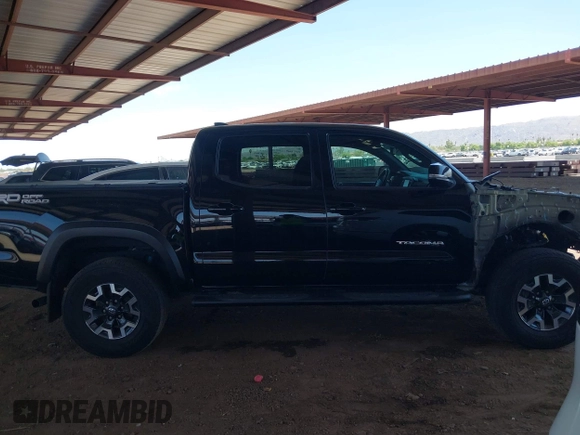 2021 Toyota Tacoma SR5 with VIN 5TFAZ5CN1MX111605, listed as a IAAI auction lot 42465381 with 67,307 mi miles and . Bid and sale history available at DreamBid. Image 14.