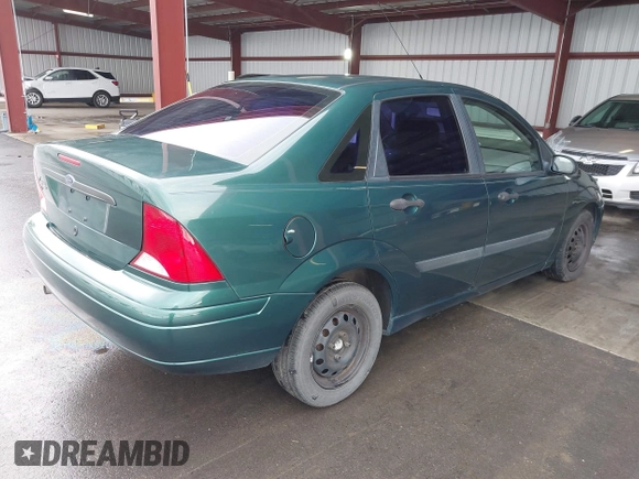 2001 Ford Focus LX with VIN 1FAFP33P51W205396, listed as a IAAI auction lot 41563111 with 95,882 mi miles and . Bid and sale history available at carsss.com. Image 4.
