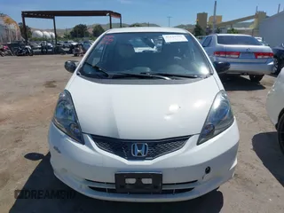 2009 Honda Fit z VIN JHMGE88239S045275, wystawiony jako IAAI lot #42142589 z przebiegiem 145 964 mil mil oraz . Historia ofert i sprzedaży dostępna na DreamBid. Obrazek 12.