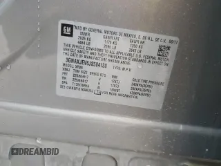 2018 Chevrolet Equinox LT z VIN 3GNAXJEV6JS504130, wystawiony jako Copart lot #87847015 z przebiegiem Nie podano mil oraz Szkoda całkowita • Salvage title. Historia ofert i sprzedaży dostępna na DreamBid. Obrazek 13.