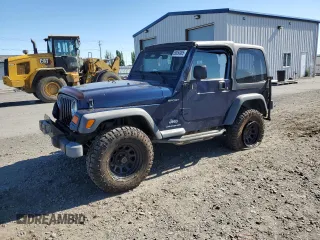 2003 Jeep Wrangler Sport z VIN 1J4FA49S63P361676, wystawiony jako Copart lot #59054905 z przebiegiem 123 184 mil mil oraz Szkoda całkowita • Salvage title. Historia ofert i sprzedaży dostępna na DreamBid. Obrazek 1.