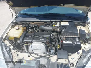 2001 Ford Focus ZX3 z VIN 3FAFP31381R210045, wystawiony jako IAAI lot #41912083 z przebiegiem 52 931 mil mil oraz . Historia ofert i sprzedaży dostępna na DreamBid. Obrazek 10.