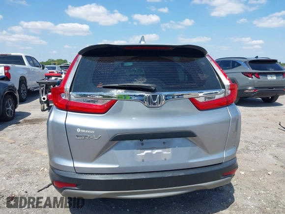 2019 Honda CR-V LX with VIN 2HKRW5H31KH411771, listed as a IAAI auction lot 42060193 with 175,036 mi miles and . Bid and sale history available at DreamBid. Image 16.