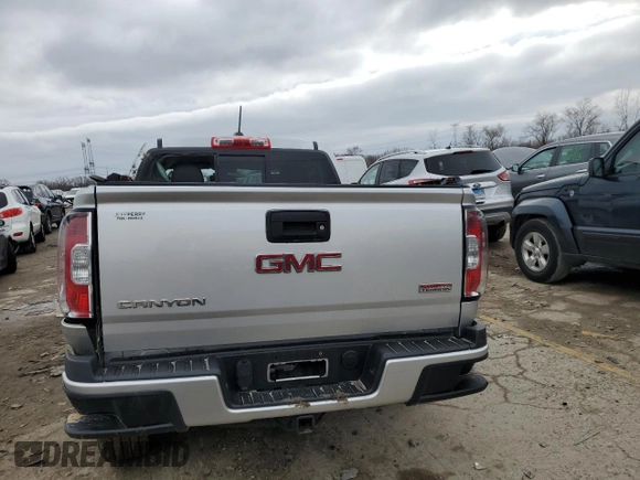 2016 GMC Canyon 4WD SLE with VIN 1GTG6CE32G1394199, listed as a Copart auction lot 87009604 with 0 mi miles and Salvage Title. Bid and sale history available at carsss.com. Image 6.