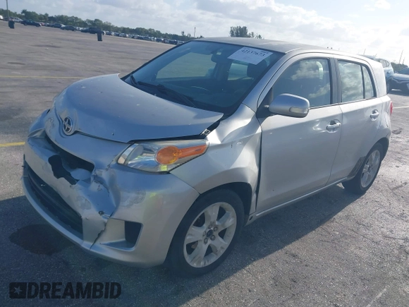 2010 Scion xD with VIN JTKKU4B4XA1002072, listed as a IAAI auction lot 42137673 with 143,660 mi miles and . Bid and sale history available at DreamBid. Image 2.