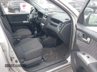 2005 Kia Sportage LX with VIN KNDJF723757087655, listed as a IAAI auction lot 41706354 with 164,736 mi miles and . Bid and sale history available at carsss.com. Image 5.