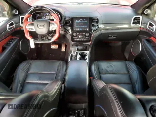2020 Jeep Grand Cherokee Trackhawk with VIN 1C4RJFN95LC334610, listed as a Copart auction lot 49160944 with 23,348 mi miles and Salvage title. Bid and sale history available at DreamBid. Image 8.