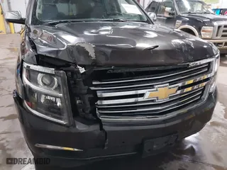 2016 Chevrolet Tahoe LTZ with VIN 1GNSKCKC7GR455033, listed as a IAAI auction lot 40811560 with 165,845 mi miles. Bid and sale history available at carsss.com. Image 6.