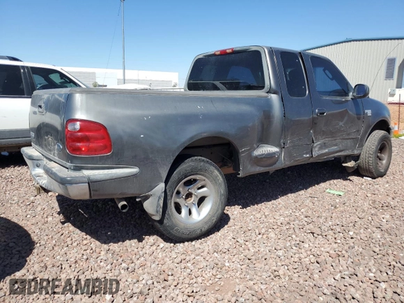 2003 Ford F-150 XL with VIN 1FTRX07WX3KD43808, listed as a Copart auction lot 47951714 with 279,206 mi miles and Salvage title. Bid and sale history available at DreamBid. Image 3.
