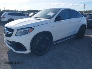 2018 Mercedes-Benz GLE 63 S AMG with VIN 4JGED7FB3JA099383, listed as a IAAI auction lot 41215972 with 44,057 mi miles and . Bid and sale history available at DreamBid. Image 2.