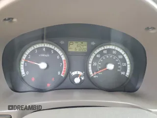 2009 Kia Rio LX with VIN KNADE223896456292, listed as a Copart auction lot 54990605 with 61,220 mi miles and Salvage Title. Bid and sale history available at DreamBid. Image 9.