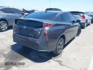 2017 Toyota Prius Two with VIN JTDKARFU1H3534154, listed as a IAAI auction lot 42531808 with 123,954 mi miles and . Bid and sale history available at DreamBid. Image 4.