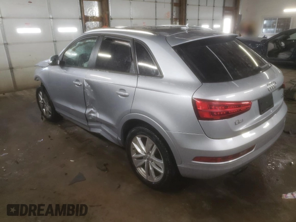 2017 Audi Q3 Premium z VIN WA1ECCFS2HR003491, wystawiony jako Copart lot #89381305 z przebiegiem 82 748 mil mil oraz Szkoda całkowita • Salvage title. Historia ofert i sprzedaży dostępna na DreamBid. Obrazek 2.