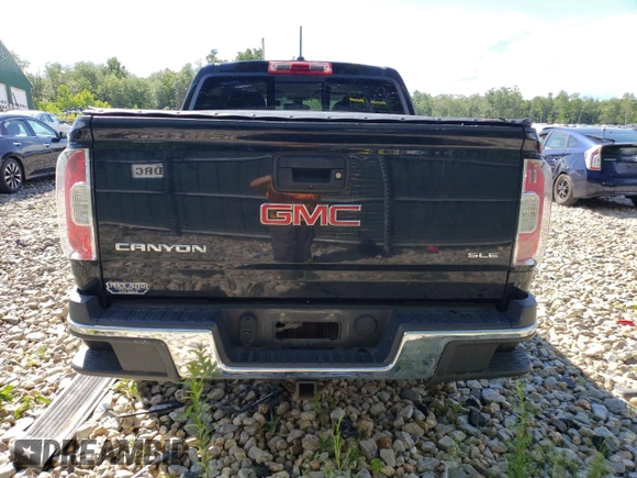 2015 GMC Canyon 4WD SLE with VIN 1GTG6BE34F1252557, listed as a Copart auction lot 61313294 with 16,084 mi miles and Salvage Title. Bid and sale history available at carsss.com. Image 6.