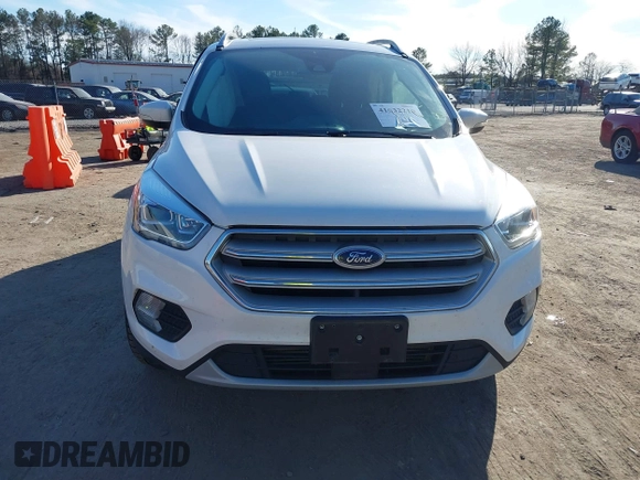 2019 Ford Escape Titanium with VIN 1FMCU9J91KUB21842, listed as a IAAI auction lot 41632210 with 104,900 mi miles. Bid and sale history available at carsss.com. Image 12.
