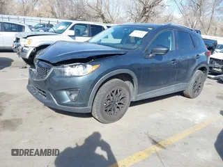 2013 Mazda CX-5 Touring with VIN JM3KE2CE6D0122405, listed as a IAAI auction lot 41743037 with 154,647 mi miles and . Bid and sale history available at carsss.com. Image 18.
