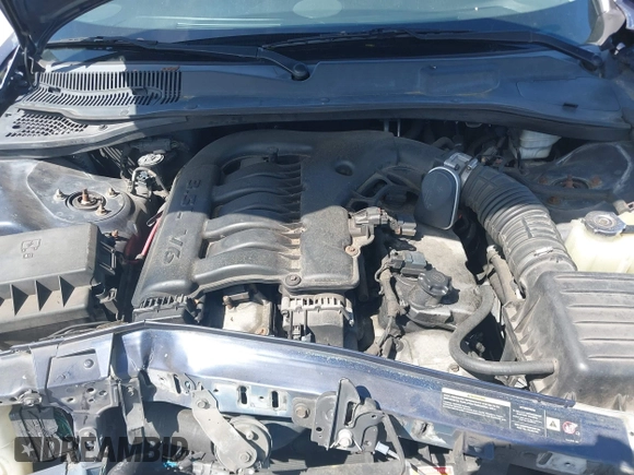 2005 Chrysler 300 with VIN 2C3JA53G25H167944, listed as a IAAI auction lot 41963114 with 196,635 mi miles. Bid and sale history available at carsss.com. Image 10.