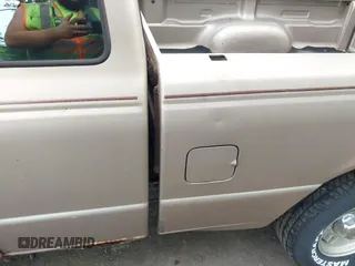 1996 Ford Ranger Splash with VIN 1FTCR14X6TTA69715, listed as a IAAI auction lot 42220603 with 292,607 mi miles and . Bid and sale history available at DreamBid. Image 6.