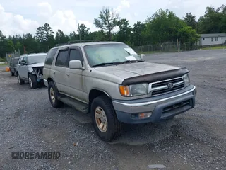 1999 Toyota 4Runner SR5 z VIN JT3GN86RXX0122884, wystawiony jako IAAI lot #42475427 z przebiegiem 143 853 mil mil oraz . Historia ofert i sprzedaży dostępna na DreamBid. Obrazek 1.