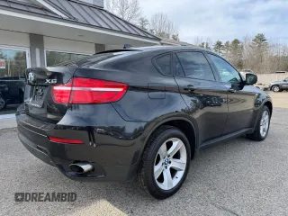 2014 BMW X6 xDrive35i z VIN 5UXFG2C57E0K41455, wystawiony jako Copart lot #58616315 z przebiegiem 162 232 mil mil oraz Tytuł czysty. Historia ofert i sprzedaży dostępna na DreamBid. Obrazek 4.