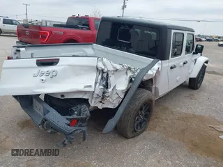 2023 Jeep Gladiator Overland z VIN 1C6HJTFG7PL566484, wystawiony jako IAAI lot #42424428 z przebiegiem 52 057 mil mil oraz . Historia ofert i sprzedaży dostępna na DreamBid. Obrazek 4.