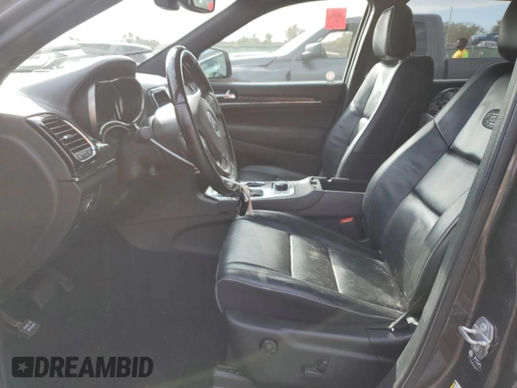 2021 Jeep Grand Cherokee Overland with VIN 1C4RJFCG9MC620320, listed as a Copart auction lot 85609814 with 61,335 mi miles and Salvage title. Bid and sale history available at DreamBid. Image 7.