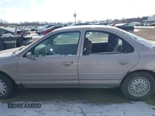 1996 Ford Contour LX с VIN 1FALP6530TK105053, выставлен на аукционе IAAI как лот 41287231 с пробегом 115 177 миль миль и . История ставок и продаж доступна на DreamBid. Изображение 14.