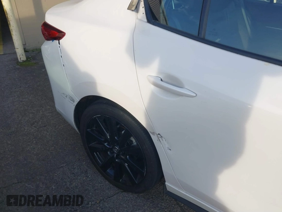 2022 Mazda 3 2.5 Turbo with VIN 3MZBPBAY2NM311824, listed as a IAAI auction lot 41038030 with 21,669 mi miles and . Bid and sale history available at DreamBid. Image 21.