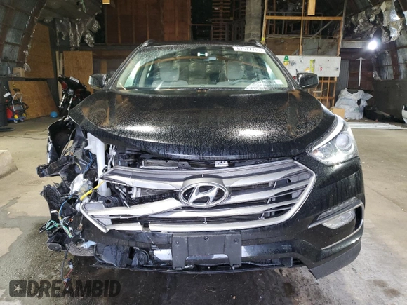 2017 Hyundai Santa Fe 2.4L with VIN 5NMZUDLB1HH013853, listed as a Copart auction lot 62577715 with 65,336 mi miles and Salvage title. Bid and sale history available at DreamBid. Image 5.