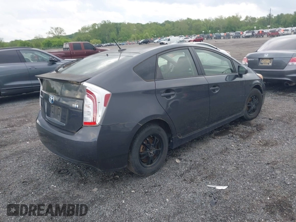 2013 Toyota Prius One with VIN JTDKN3DU8D1716993, listed as a IAAI auction lot 42202519 with 182,421 mi miles and . Bid and sale history available at DreamBid. Image 4.