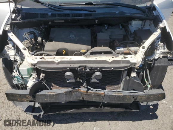 2012 Toyota Sienna LE AAS with VIN 5TDKK3DC4CS217089, listed as a Copart auction lot 64078095 with 266,382 mi miles and Salvage title. Bid and sale history available at DreamBid. Image 12.