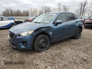 2016 Mazda CX-5 Touring with VIN JM3KE4CY0G0659040, listed as a Copart auction lot 51946565 with 89,553 mi miles and Salvage Title. Bid and sale history available at carsss.com. Image 1.