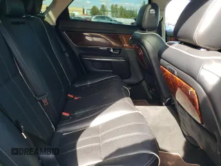 2011 Jaguar XJ with VIN SAJXA2GE5BMV13122, listed as a Copart auction lot 73113044 with 164,196 mi miles and Salvage Title. Bid and sale history available at DreamBid. Image 10.